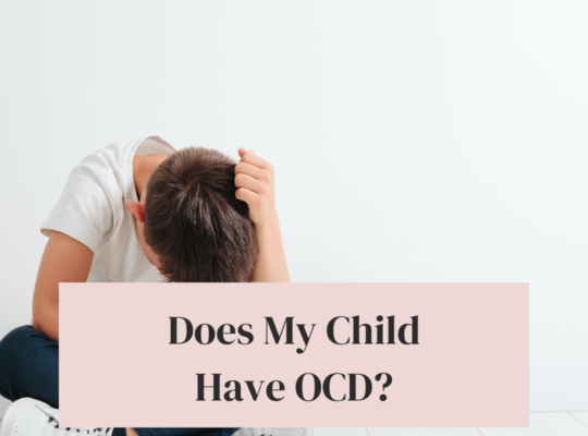 Does my child have ocd: image of a boy holding his head in his hands